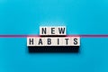 New Habits word concept on cubes