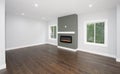 New hardwood flooring and fireplace have been installed in a home renovation Royalty Free Stock Photo
