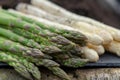 New harvest of  white and green asparagus vegetable in spring season, asparagus growing up from the ground on farm Royalty Free Stock Photo