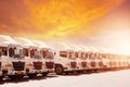 New haulage truck fleet is parking narrow at yard with sunset Royalty Free Stock Photo