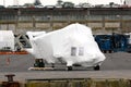 New helicopter covered in protective plastic wrap