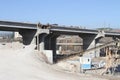 New highway under construction. A new bridge freeway made of concrete and metal to pass traffic from big city Royalty Free Stock Photo