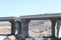 New highway under construction. A new bridge freeway made of concrete and metal to pass traffic from big city Royalty Free Stock Photo