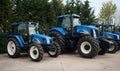 New Holland tractors on display in a dealer`s yard