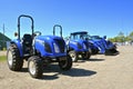 New Holland tractors on display at a farm show