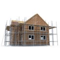 New home being built with bricks on white. 3D illustration Royalty Free Stock Photo