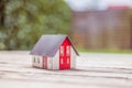 New home and house concept: Red house model outdoors Royalty Free Stock Photo