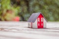 New home and house concept: Red house model outdoors Royalty Free Stock Photo