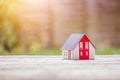 New home and house concept: Red house model outdoors Royalty Free Stock Photo