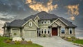 New Home House Custom Green Exterior Dramatic Cloudy Sky Background