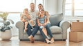 New home, sofa and portrait of parents and children in living room for bonding, quality time and relax together. Happy Royalty Free Stock Photo