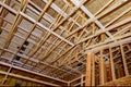 A new home under construction interior and plumbing inside a house frame Royalty Free Stock Photo