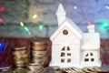 A new house as a gift. Money for the holiday. Holiday New Year and Christmas Royalty Free Stock Photo