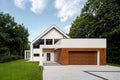 New house with cobblestone driveway