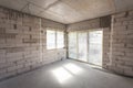 New house under construction. Aerated concrete blocks, cement brickwork walls, plastic window, electric wiring installation. Royalty Free Stock Photo