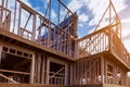 New house under construction framing against a blue sky Royalty Free Stock Photo