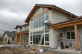 Exterior view of new house under construction and painting Royalty Free Stock Photo