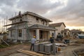 Construction residential new house in progress at building site Royalty Free Stock Photo