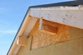 New house wall facade insulation against blue sky. Roof insulation detail. Royalty Free Stock Photo