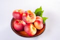 New hybrid sweet fruit nectarina platerina, flat Saturn or donut nectarine peaches close up