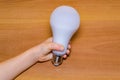 new idea concept hand holding light bulb Royalty Free Stock Photo