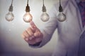 New idea creative idea.Concept of idea and innovation.Hand touch Light blub Royalty Free Stock Photo