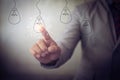 New idea creative idea.Concept of idea and innovation.Hand touch Light blub Royalty Free Stock Photo