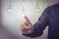 New idea creative idea.Concept of idea and innovation.Hand touch Light blub Royalty Free Stock Photo