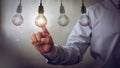 New idea creative idea.Concept of idea and innovation.Hand touch Light blub Royalty Free Stock Photo