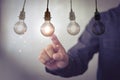 New idea creative idea.Concept of idea and innovation.Hand touch Light blub Royalty Free Stock Photo