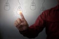 New idea creative idea.Concept of idea and innovation.Hand touch Light blub Royalty Free Stock Photo