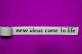 New ideas come to Life, Inspiration, Motivation and business concept on purple torn paper