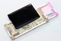 New Indian currency of 2000 and 500 rupee notes into the money purse. Royalty Free Stock Photo