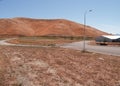 New industrial land in summer drought colours subdivided and roaded awaiting development of new buildings