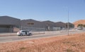 New industrial land in summer drought colours subdivided and roaded awaiting development of new buildings