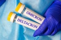 New infectious Deltacron variant of coronavirus desease Delta and Omicron sample in lab tube on light medical background.