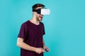 New innovations. guy getting experience using VR-headset glasses. man in virtual reality goggles. game console using Royalty Free Stock Photo