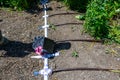 New installation of an irrigation system in a large garden, white PVC pipe and connectors and brown hose Royalty Free Stock Photo