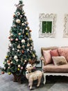 New interior with Christmas tree and reindeer Royalty Free Stock Photo