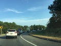 New Jersey Turnpike off ranmp at rush hour on Summer day. Lots of traffic.