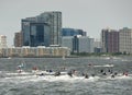 New Jersey, USA - June 9, 2018: People on water motorcycle in Hudson River and Jersey City at the background