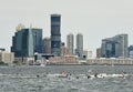 New Jersey, USA - June 9, 2018: People on water motorcycle in Hudson River and Jersey City at the background
