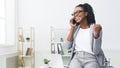 New Job Opportunity. Excited African Woman Talking On Phone Royalty Free Stock Photo