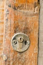 New key lock on old wooden door Royalty Free Stock Photo