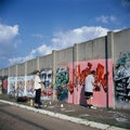 New Kids On The Block Drawing Graffiti On Wall Royalty Free Stock Photo