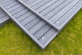 New Laid Composite Decking Ash Colour and with Decking Lights Installed Royalty Free Stock Photo