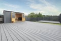 New Laid Composite Decking Ash Colour and with Decking Lights Installed Royalty Free Stock Photo