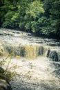 New Lanark in Scotland, famous Heritage site with blustering river Clyde Royalty Free Stock Photo