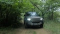 Land Rover Defender 2020 - Test drive in forest. Next the river Nistru Royalty Free Stock Photo