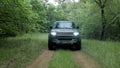 Land Rover Defender 2020 - Test drive in forest. Next the river Nistru Royalty Free Stock Photo